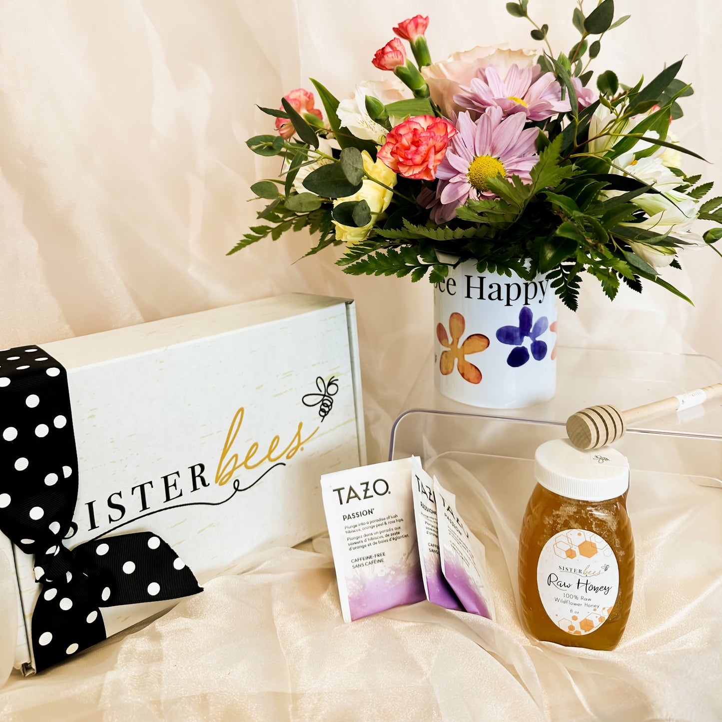 
                  
                    Gift: Bee Happy Box with floral arrangement
                  
                